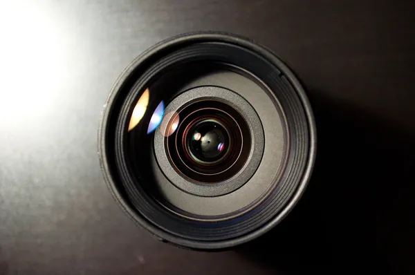 stock image Photo lens on black background