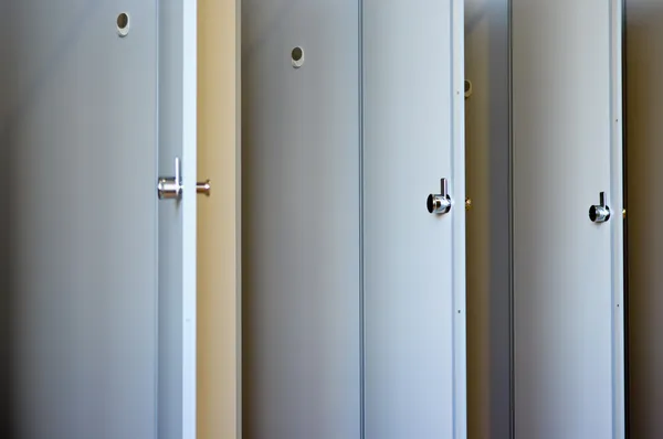 Doors and partitions in a toilet — Stock Photo, Image
