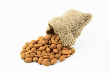 Spilled Natural Whole Almonds. clipart