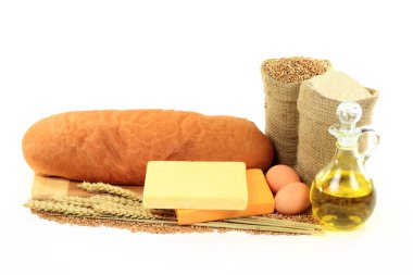 Natürmort resim ürünleri (sert buğday taneleri, tam buğday unu, zeytinyağı, yumurta, buğday kulaklar, eski kaşar peyniri) kullanmak için yapılan eski kaşar peyniri ove ekmek