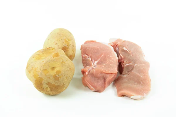 Imagem Ainda Produtos Cozinha Costeletas Porco Desossadas Batatas Sobre Branco — Fotografia de Stock