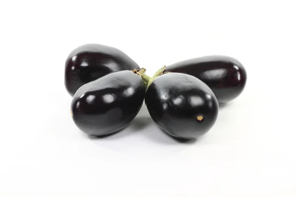 Pile Italian Baby Eggplants on white. — Stock Photo, Image