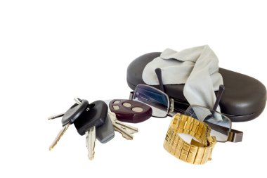 Keys, glasses and a watch clipart