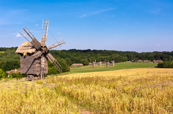 stock image Old wooden windmill in the countryside