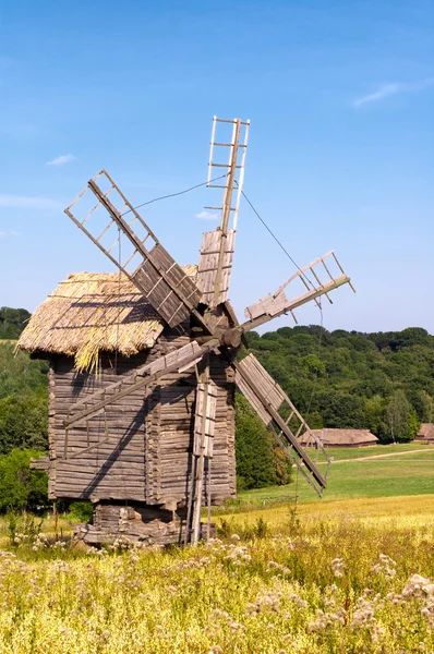 stock image Old wooden windmill in the countryside