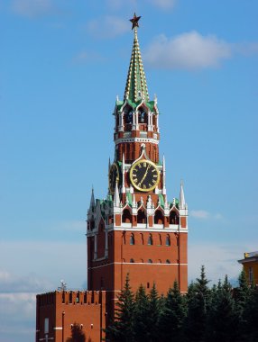 The Spasskaya Tower is the main tower with a through-passage on the eastern wall of the Moscow Kremlin (Russia), which overlooks the Red Square. clipart