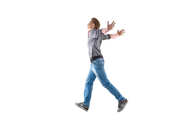 Hombre Joven Está Saltando Sobre Fondo Blanco — Foto de Stock