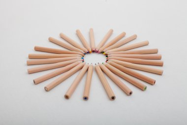 Colored pencils in circle clipart