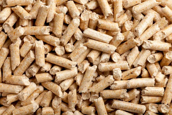 Wood pellets background — Stockfoto