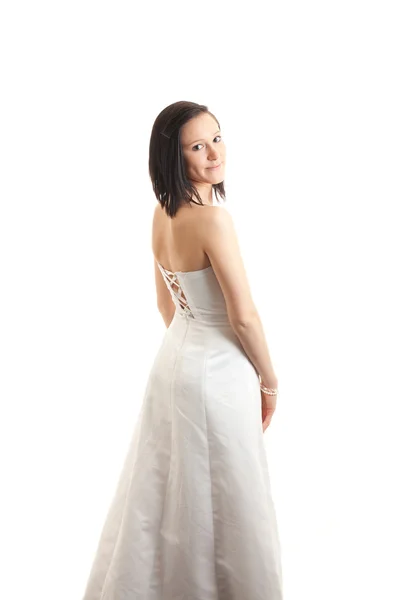 Sukienka młodej womand powrotem na białym tle — Zdjęcie stockowe