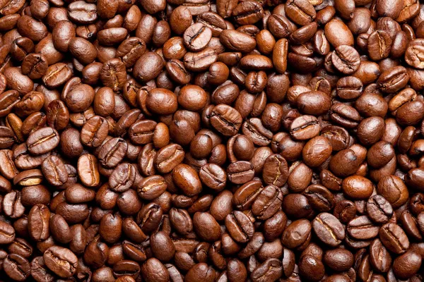 Cofee Bohnen Hintergrund lizenzfreie Stockbilder