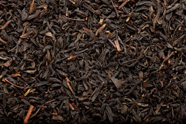 Schwarzer Tee Hintergrund Stockbild