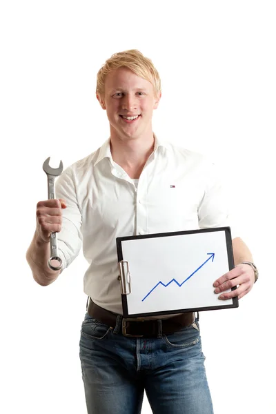Young businessman chart wrench — Stock Photo, Image