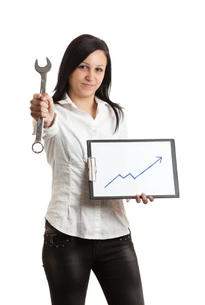 Young businesswoman chart and wrench — Stock Photo, Image