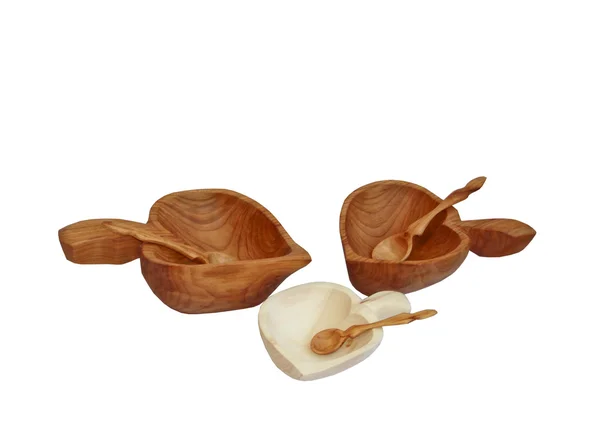 Three wooden plates in the form of a leaf with spoons — Stock Photo, Image