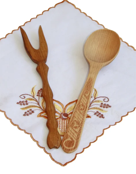 Drewnianą łyżką i pluginu na haftowane serwetki — Zdjęcie stockowe