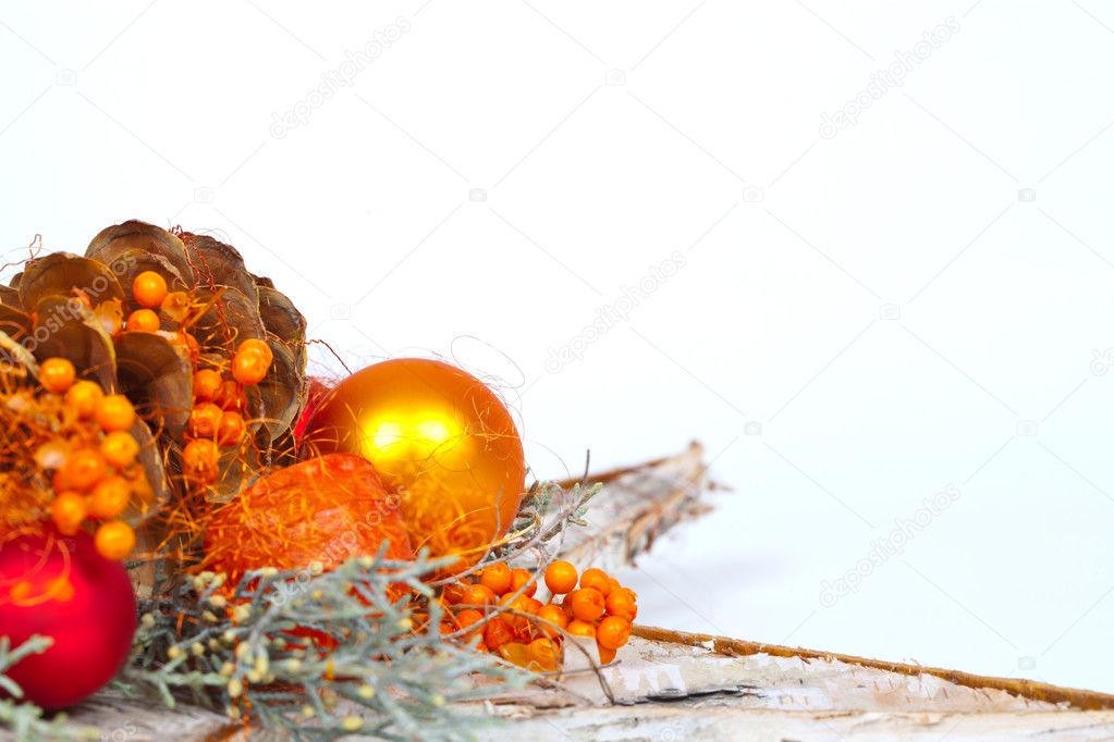 A Decoration, made on top of a white Star, with orange balls and fruits
