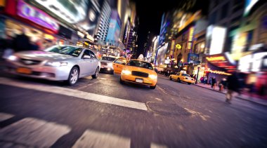 Blurred image of yellow taxi cab clipart