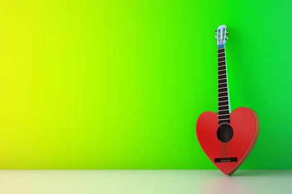 Yeşil duvar karşı kırmızı gitar kalp şeklinde — Stok fotoğraf