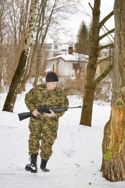 Hunter or soldier in a forest — Stock Photo, Image