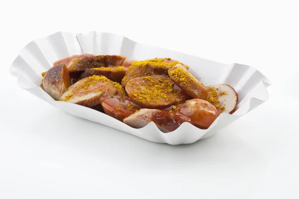 Бурлящая Колбаса Бумажной Тарелке Eine Angerichtete Currywurst Auf Einem Pappteller Стоковое Изображение
