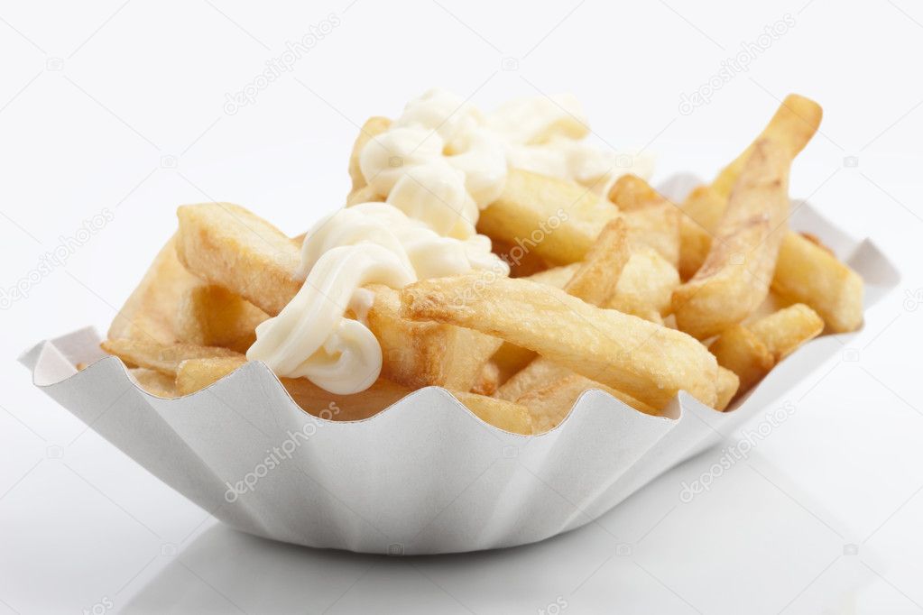 French fries with mayonnaise on a paper plate, Pommes mit mayonnaise auf einem Pappteller