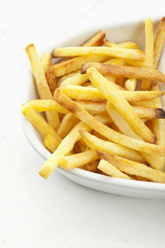 French fries on a plate, Pommes auf einem Teller