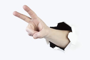 Eine el zeigt das zafer-zeichen, elini zafer işareti gösterir.