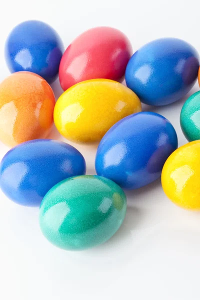 stock image Several eggs colored for easter, bunte Ostereier auf weissem Untergrund,