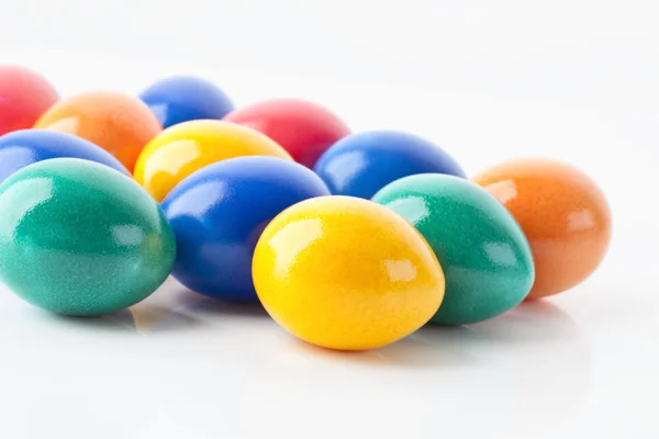 stock image Several eggs colored for easter, bunte Ostereier auf weissem Untergrund,