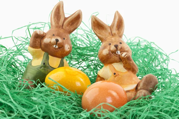 Two Easter Bunnies Sitting Nest Eggs — Stock Photo, Image