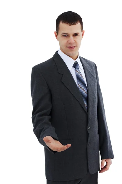 Successful young businessman with open hand - isolated — Stock Photo, Image