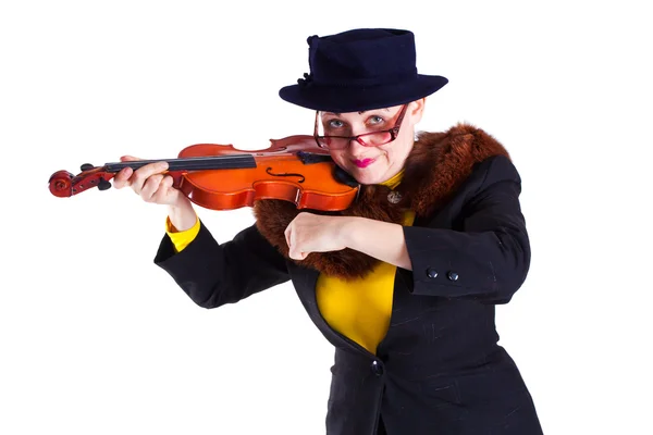 En flicka klädd som en äldre gammal dam spela fiol — Stockfoto