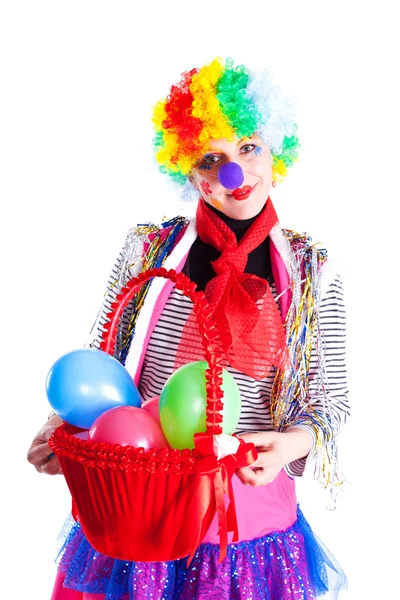 Dívka ve světlé karnevalové kostýmy s košíkem balónků — Stock fotografie