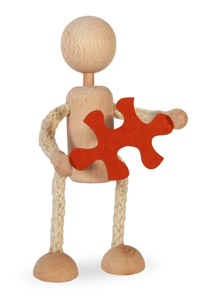 Figure Made Wood Holds Red Puzzle — Stock Photo, Image