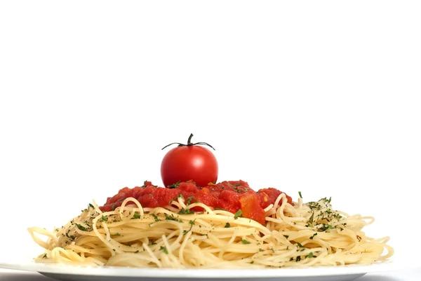Spaghetti med tomater Stockfoto
