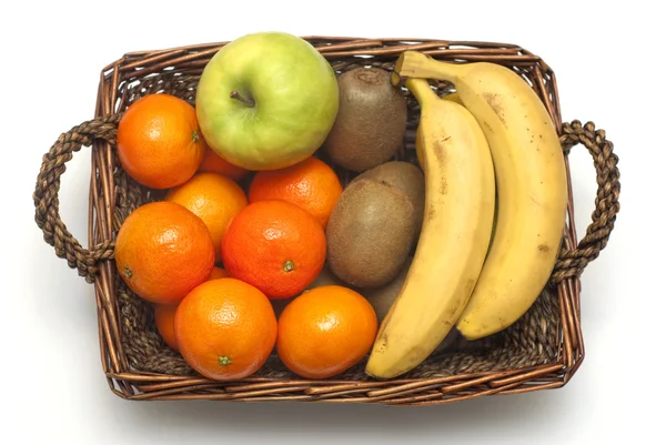 Stock image Healthy fruits in a wicker basket isolated on white