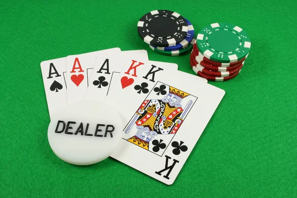 Full House with a dealer chip on top — Stock Photo, Image