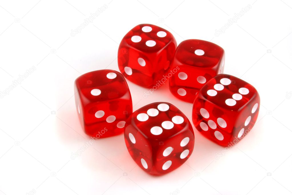 5 dice thrown onto a table on a white background