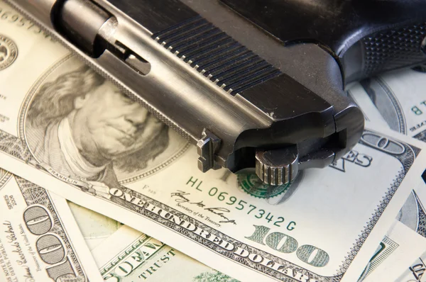 枪和钱是犯罪 黑手党的象征 图像可以用于照亮主题军火贸易 毒品战争 免版税图库图片