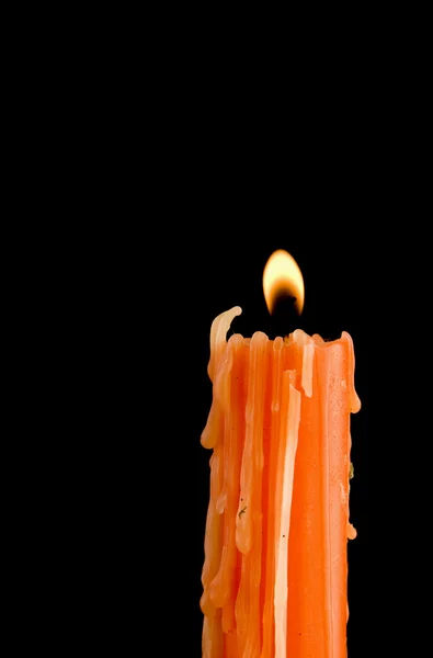 stock image Burning orange candle