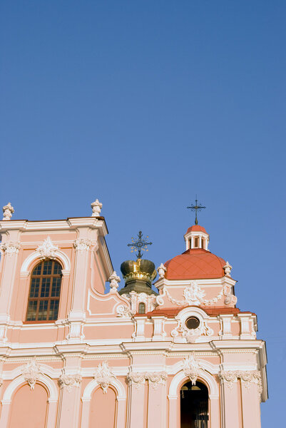 Fragment of St. Casimir's church in Vilnius on a background of blue sky