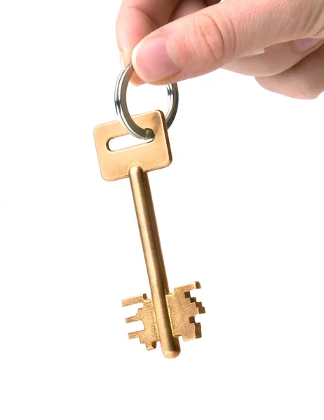 Menschliche Hand Hält Einen Goldenen Schlüssel Auf Weißem Hintergrund — Stockfoto