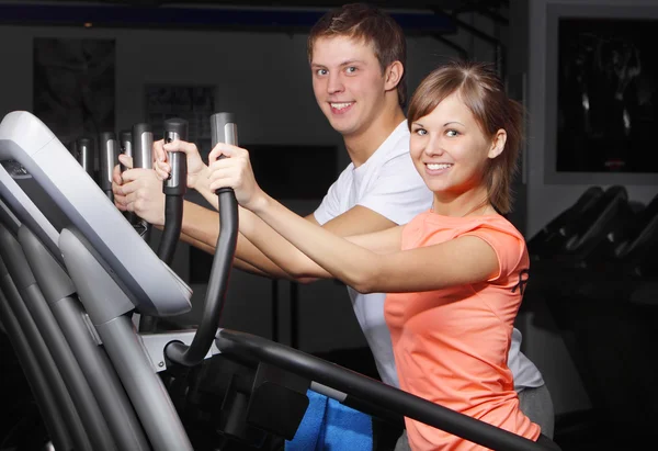 Young Couple Exercise Bicycle Fitness Club — Stock Photo, Image
