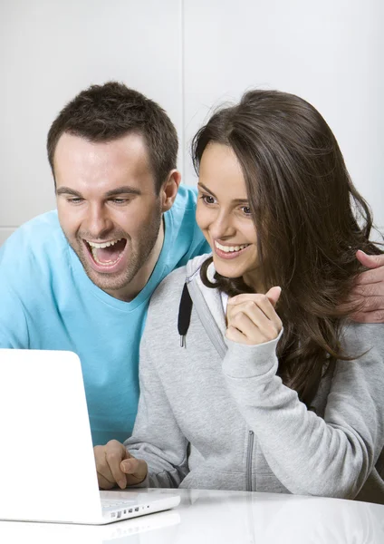 Laughing young couple — Stock Photo, Image