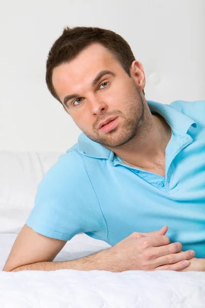 stock image Man on bed