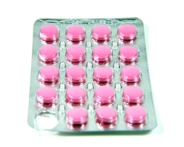 Roze Pillen Een Blister Geïsoleerd Wit — Stockfoto