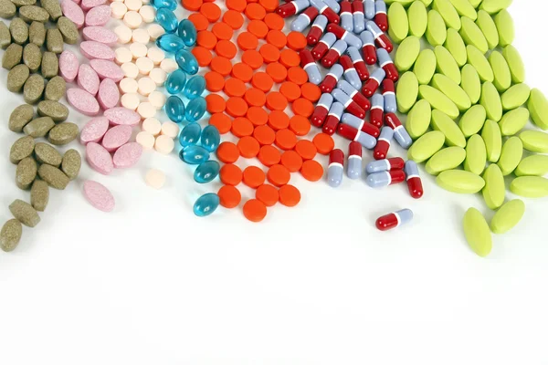 Many Different Pills Lined White Background — Stock Photo, Image