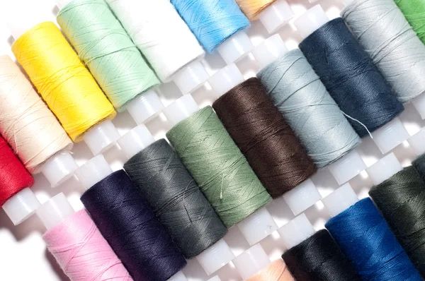 stock image Group of multicolored sewing threads