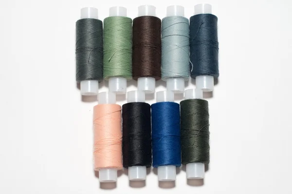 stock image Group of multicolored sewing threads